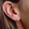 Diamond_moon_earrings_on_model