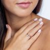 Five_diamond_stackable_V_ring_on_hand