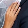 Scattered_diamond_ring_on_hand