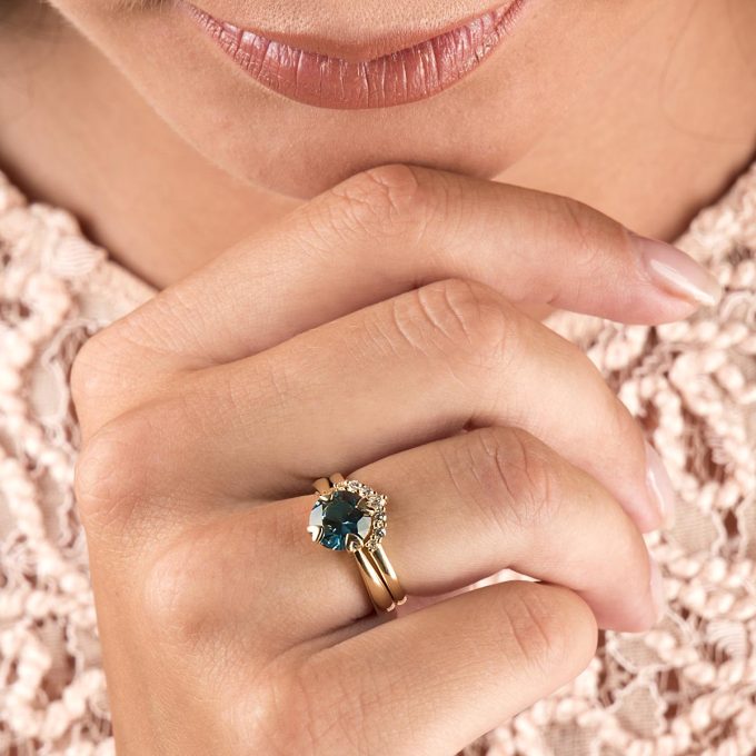 Stacking_diamond_wedding_ring_crown_on_hand
