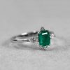 One_of_a_kind_emerald_and_diamond_engagement_ring_detail
