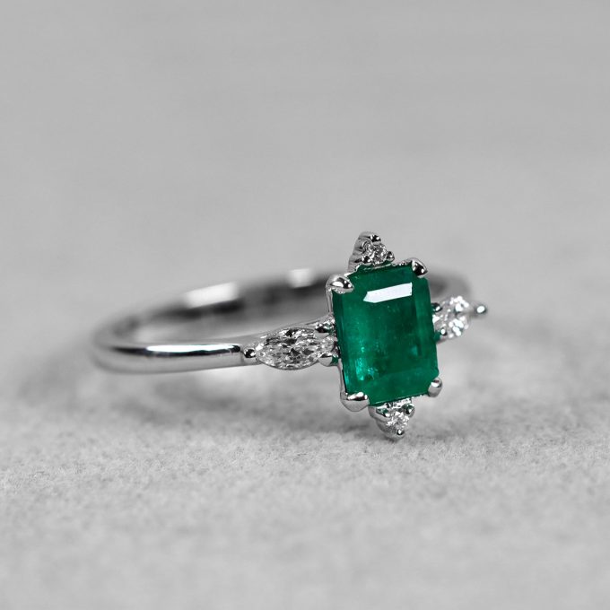 One_of_a_kind_emerald_and_diamond_engagement_ring_detail