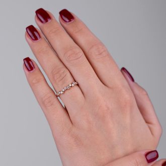 Scattered_half_eternity_diamond_ring_on_hand