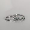 Scattered_green_diamonds_engagement_ring_details