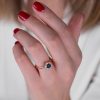 Sapphire_and_diamond_engagement_ring_Snowflake_on_model