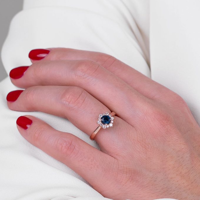 Sapphire_and_diamond_engagement_ring_Snowflake_on_hand