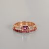 Pink_sapphire_baguette_and_diamond_engagement_ring_detail