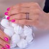 Half_eternity_diamond_wedding_ring_on_hand