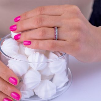 Half_eternity_diamond_wedding_ring_on_hand