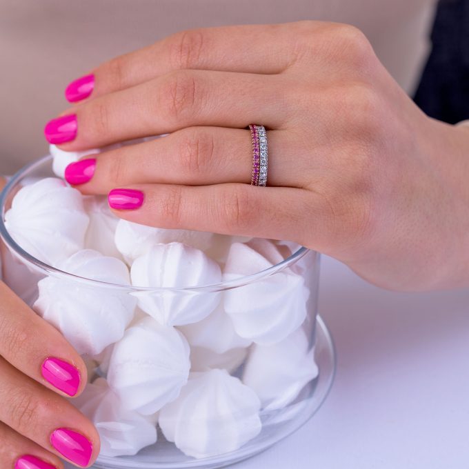 Half_eternity_diamond_wedding_ring_on_hand