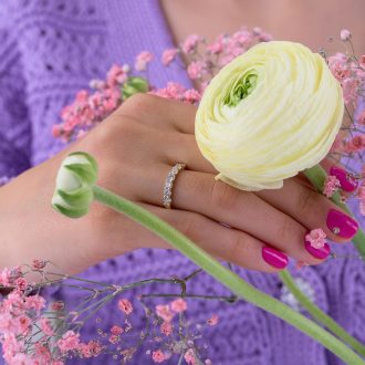 Half_eternity_wedding_ring_with_0.11ct_diamonds_on_hand