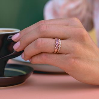 Thin_half_eternity_diamond_ring_on_hand