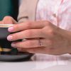 Scattered_pink_sapphire_ring_on_hand