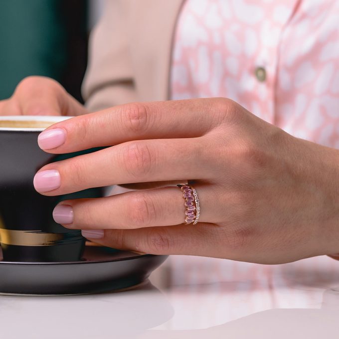 Scattered_pink_sapphire_ring_on_hand
