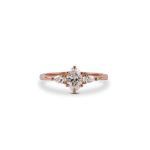 Oval_diamond_and_pear_engagement_ring_rose_gold
