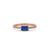 Blue_sapphire_engagement_ring_with_side_diamonds_rose_gold