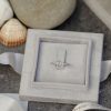 Champagne_oval_diamond_engagement_ring_in_box