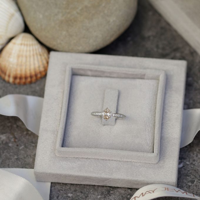 Champagne_oval_diamond_engagement_ring_in_box